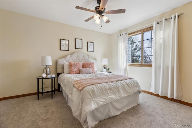bedroom featuring baseboards, carpet floors, and ceiling fan
