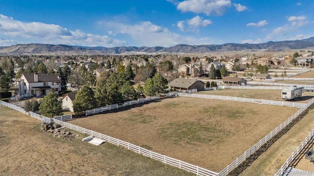 bird's eye view featuring a rural view and a mountain view