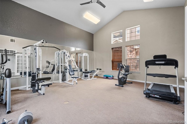 gym with ceiling fan and lofted ceiling