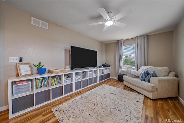 23831 Eagle Bend Ln, Parker, CO 80138 - living room with ceiling fan, wood finished floors, and baseboards