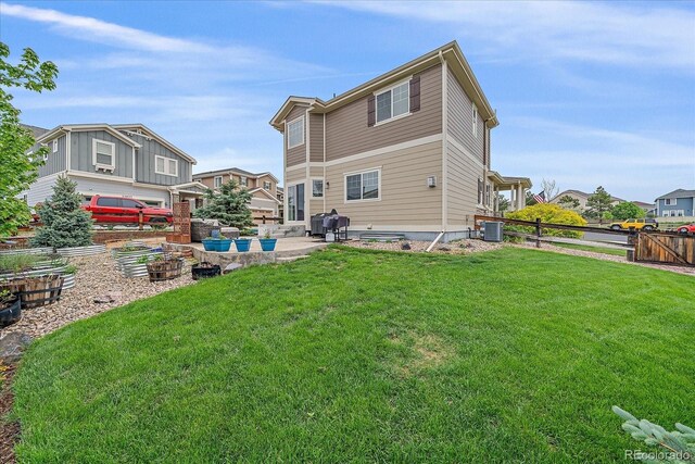 23831 Eagle Bend Ln, Parker, CO 80138 - back of house featuring a patio area and central AC unit
