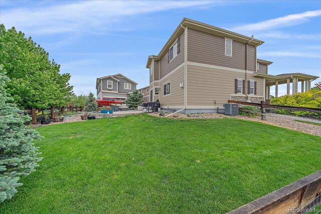 23831 Eagle Bend Ln, Parker, CO 80138 - view of home's exterior featuring central AC and a patio