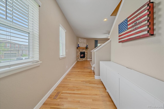 23831 Eagle Bend Ln, Parker, CO 80138 - corridor featuring baseboards, light wood finished floors, recessed lighting, and stairs