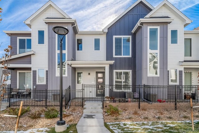 1983 S Poplar Ct, Denver, CO 80224 - view of front facade featuring board and batten siding