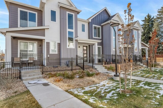 1983 S Poplar Ct, Denver, CO 80224 - view of front of property featuring board and batten siding