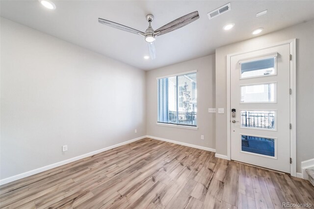 1983 S Poplar Ct, Denver, CO 80224 - entryway with light wood finished floors, a ceiling fan, and recessed lighting