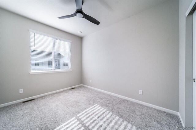 1983 S Poplar Ct, Denver, CO 80224 - empty room with carpet floors and ceiling fan