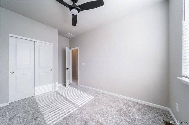 1983 S Poplar Ct, Denver, CO 80224 - unfurnished bedroom with carpet flooring, a closet, and a ceiling fan