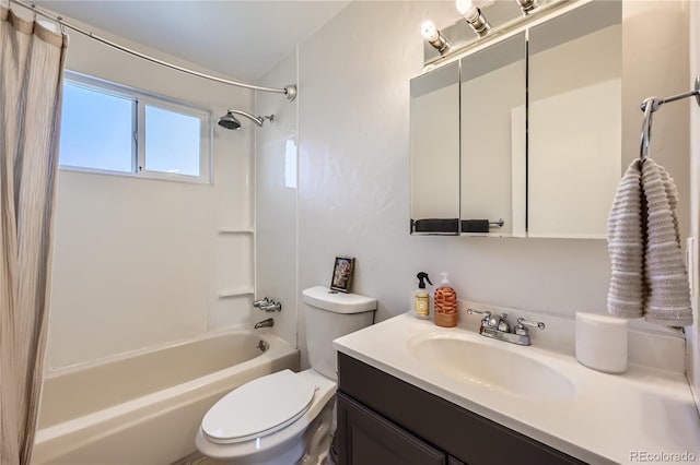 full bathroom with toilet, vanity, and bathing tub / shower combination