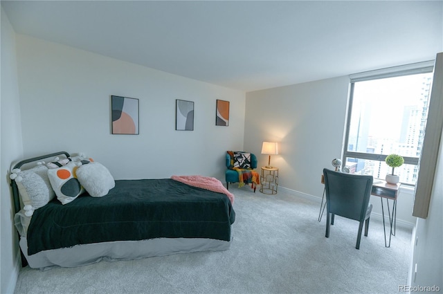 1020 15th St Unit 29L, Denver, CO 80202 - bedroom featuring carpet and baseboards