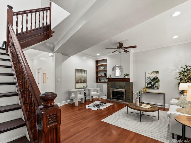 437 S Grant St, Denver, CO 80209 - living room featuring crown molding, a ceiling fan, wood finished floors, recessed lighting, and stairway