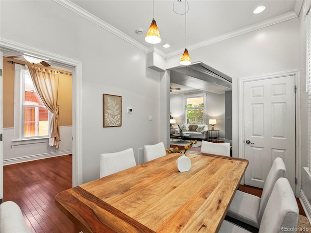 437 S Grant St, Denver, CO 80209 - dining room with dark wood-type flooring, crown molding, a wainscoted wall, and recessed lighting