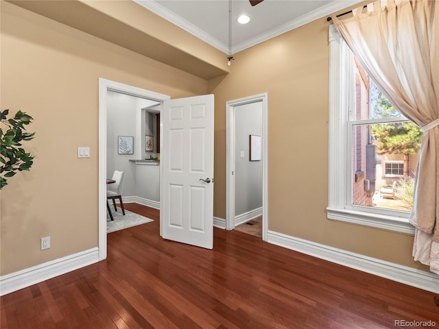 437 S Grant St, Denver, CO 80209 - empty room featuring dark wood-type flooring, crown molding, and ceiling fan