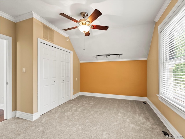 437 S Grant St, Denver, CO 80209 - unfurnished bedroom featuring carpet flooring, a closet, lofted ceiling, rail lighting, and ceiling fan