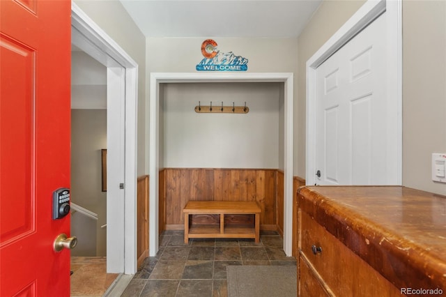 mudroom featuring a wainscoted wall