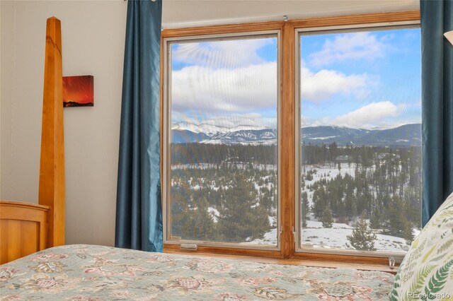 unfurnished bedroom with a mountain view