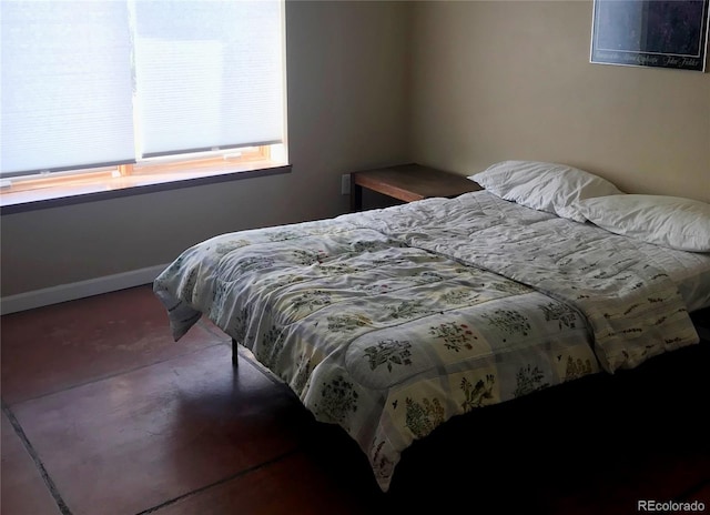 bedroom with baseboards