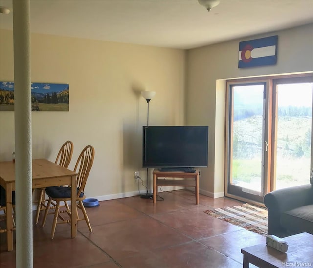 living room featuring baseboards