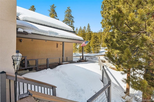 view of yard covered in snow