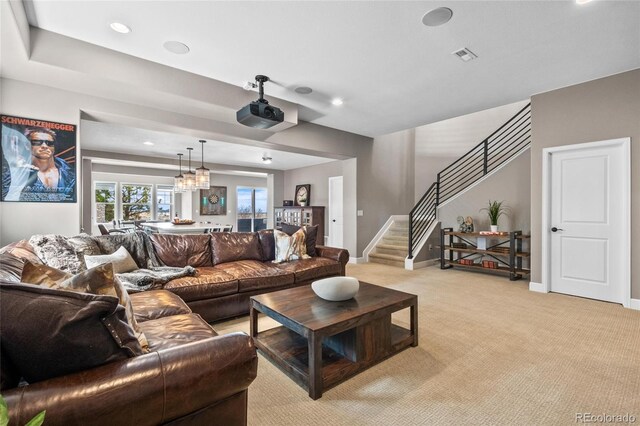 9563 Red Primrose St, Franktown, CO 80116 - living room featuring light carpet, stairs, baseboards, and recessed lighting