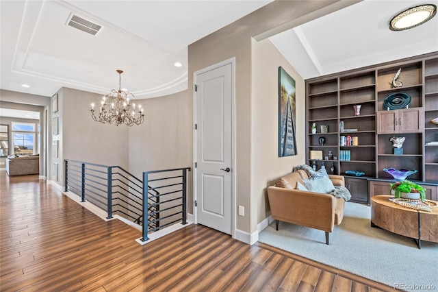9563 Red Primrose St, Franktown, CO 80116 - living area with an upstairs landing, wood finished floors, a chandelier, baseboards, and recessed lighting
