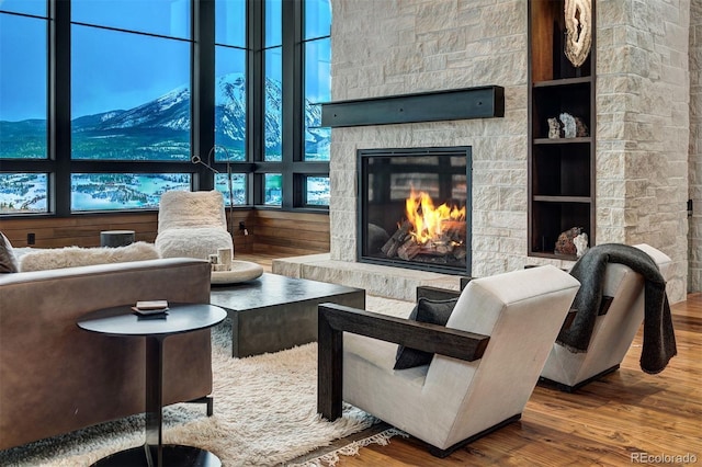65 Aerie Dr, Silverthorne, CO 80498 - living area featuring a fireplace and wood finished floors
