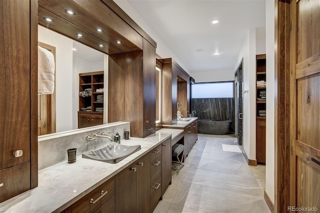 65 Aerie Dr, Silverthorne, CO 80498 - full bath with vanity, a bath, and recessed lighting