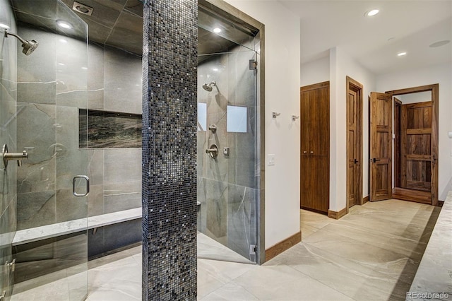 65 Aerie Dr, Silverthorne, CO 80498 - bathroom featuring a stall shower, recessed lighting, and marble finish flooring