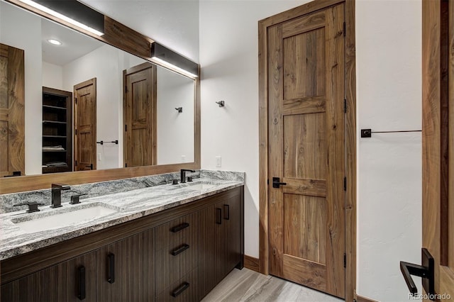 65 Aerie Dr, Silverthorne, CO 80498 - bathroom with double vanity and baseboards