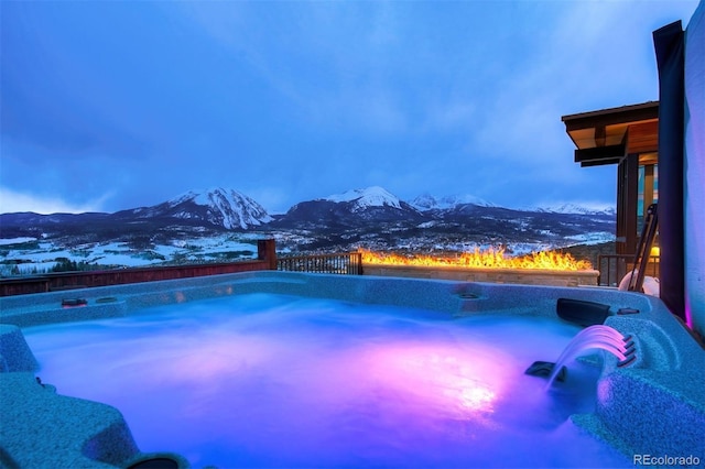 65 Aerie Dr, Silverthorne, CO 80498 - view of pool featuring a mountain view, a hot tub, and a swimming pool