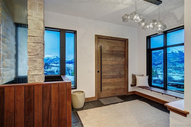 65 Aerie Dr, Silverthorne, CO 80498 - bathroom with a chandelier, tile patterned flooring, and plenty of natural light