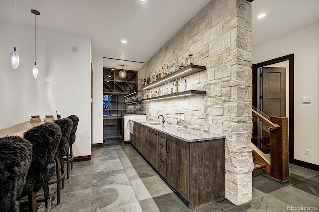 65 Aerie Dr, Silverthorne, CO 80498 - indoor wet bar with pendant lighting, recessed lighting, and stairway