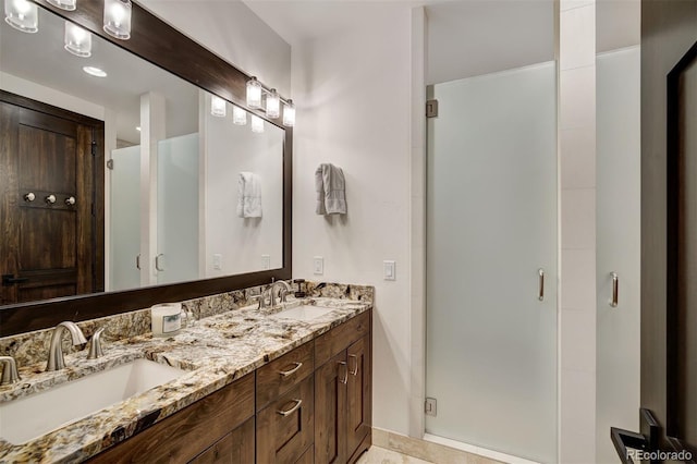 65 Aerie Dr, Silverthorne, CO 80498 - full bath with double vanity, a stall shower, and recessed lighting