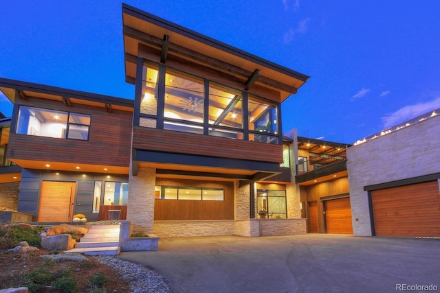65 Aerie Dr, Silverthorne, CO 80498 - contemporary home featuring stone siding and a balcony