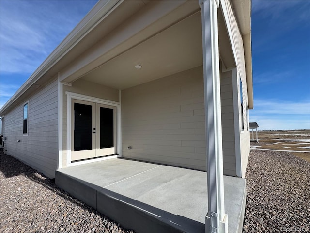 view of patio featuring french doors