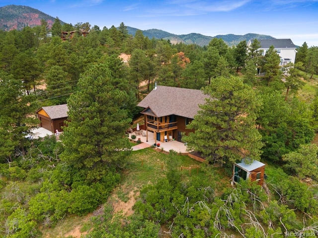 776 Hilltop Rd, Palmer Lake, CO 80133 - birds eye view of property featuring a forest view and a mountain view
