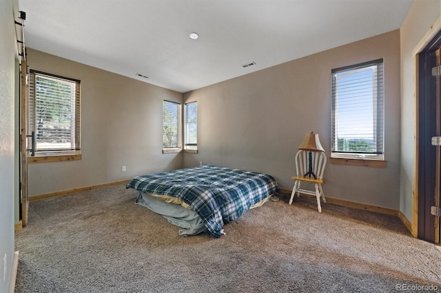 776 Hilltop Rd, Palmer Lake, CO 80133 - carpeted bedroom with baseboards and visible vents