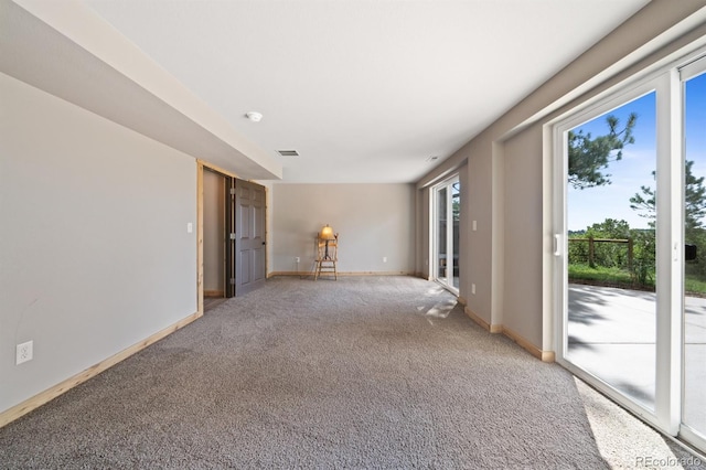 776 Hilltop Rd, Palmer Lake, CO 80133 - empty room featuring baseboards, visible vents, and light colored carpet