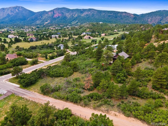 776 Hilltop Rd, Palmer Lake, CO 80133 - birds eye view of property with a mountain view