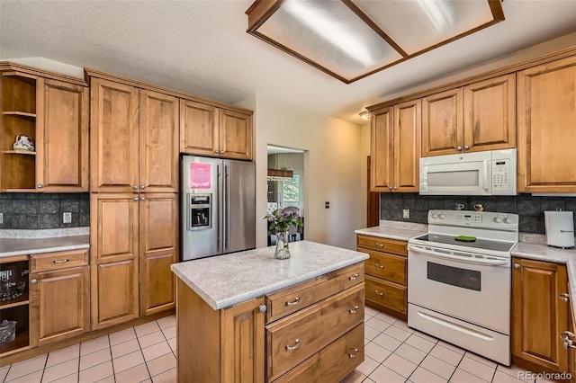 kitchen with white appliances, open shelves, light tile patterned floors, decorative backsplash, and brown cabinetry