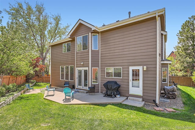 back of property with a patio