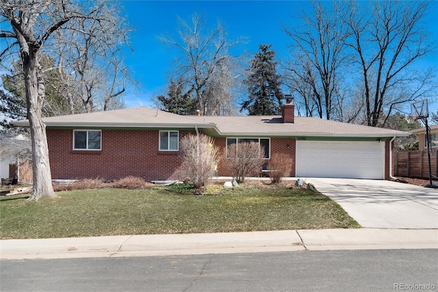 ranch-style house with a front yard, a garage, brick siding, and driveway