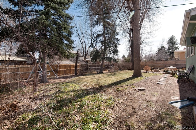 view of yard featuring a fenced backyard