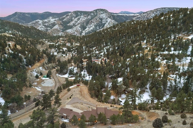 aerial view at dusk with a mountain view