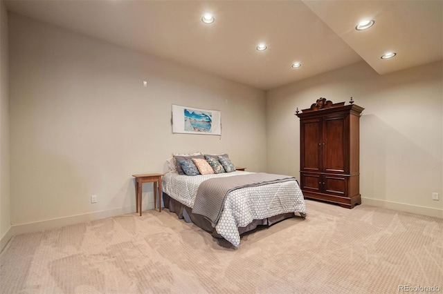 bedroom with light colored carpet