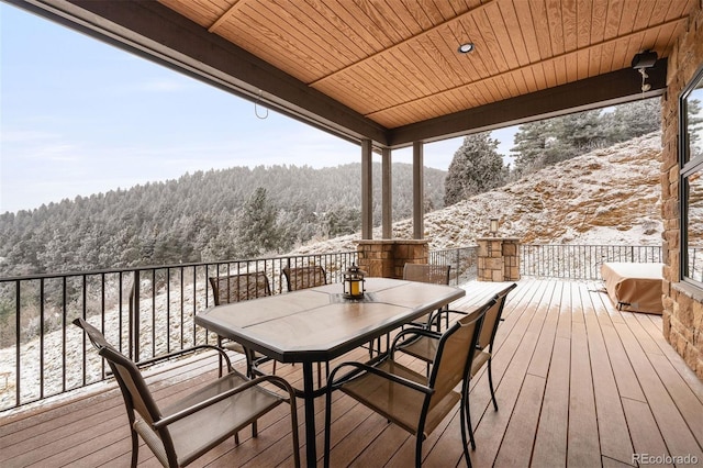 view of snow covered deck