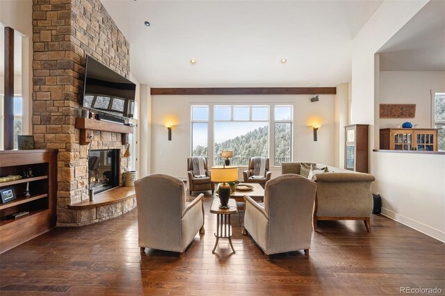 21609 Clarence Ln, Golden, CO 80401 - living room with a fireplace and dark wood-style flooring