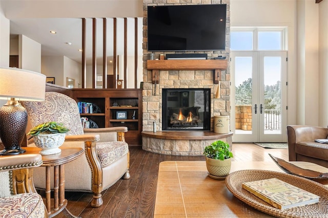 21609 Clarence Ln, Golden, CO 80401 - living area featuring hardwood / wood-style flooring, a fireplace, and french doors