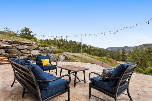 21609 Clarence Ln, Golden, CO 80401 - view of patio / terrace with a mountain view