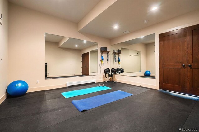 21609 Clarence Ln, Golden, CO 80401 - exercise room featuring baseboards, recessed lighting, and a baseboard heating unit